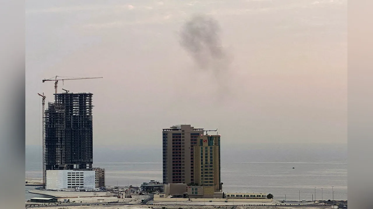 Smoke rises after a drone was intercepted during early morning hours in Manama, Bahrain, July 14, 2026. REUTERS/Stringer REFILE - QUALITY REPEAT TPX IMAGES OF THE DAY