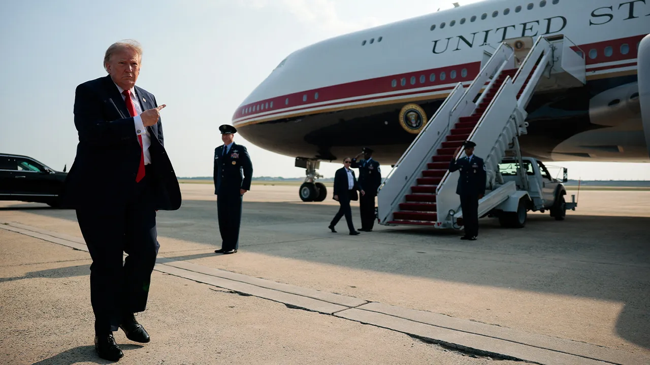 U.S. President Donald Trump points towards the new Air Force One, a plane gifted by the Qatari government, before boarding, at Joint Base Andrews, Maryland, U.S., July 1, 2026. REUTERS/Evan Vucci TPX IMAGES OF THE DAY