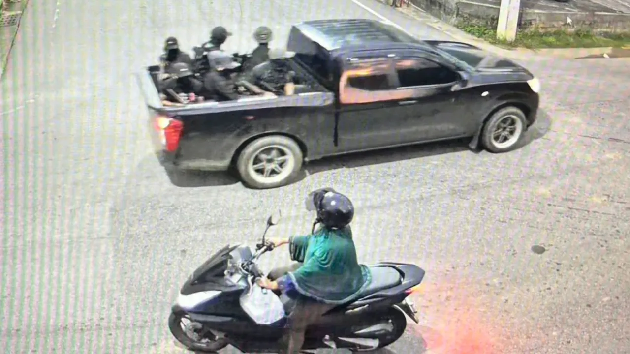 This image taken from video provided by Internal Security Operations Command Region 4 shows a group of the alleged attackers riding on a back of a black pickup truck before they opened fire and threw pipe bombs at soldiers at a security checkpoint in Narathiwat province, Thailand, Wednesday, July 22, 2026. (Internal Security Operations Command Region 4 via AP)