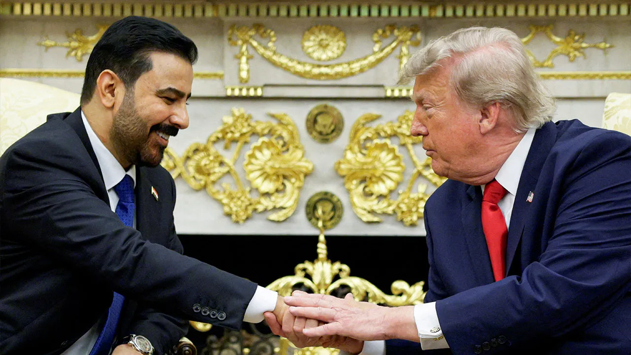 U.S. President Donald Trump shakes hands with Iraqi Prime Minister Ali al-Zaidi as they participate in a bilateral meeting in the Oval Office at the White House in Washington, D.C., U.S., July 14, 2026. REUTERS/Evan Vucci