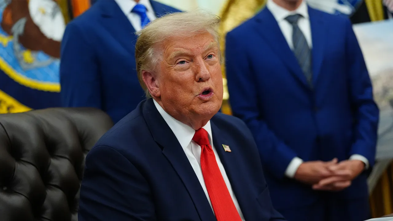 President Donald Trump speaks in the Oval Office of the White House about Dulles International Airport modernization, Wednesday, July 29, 2026, in Washington. (AP Photo/Julia Demaree Nikhinson)
