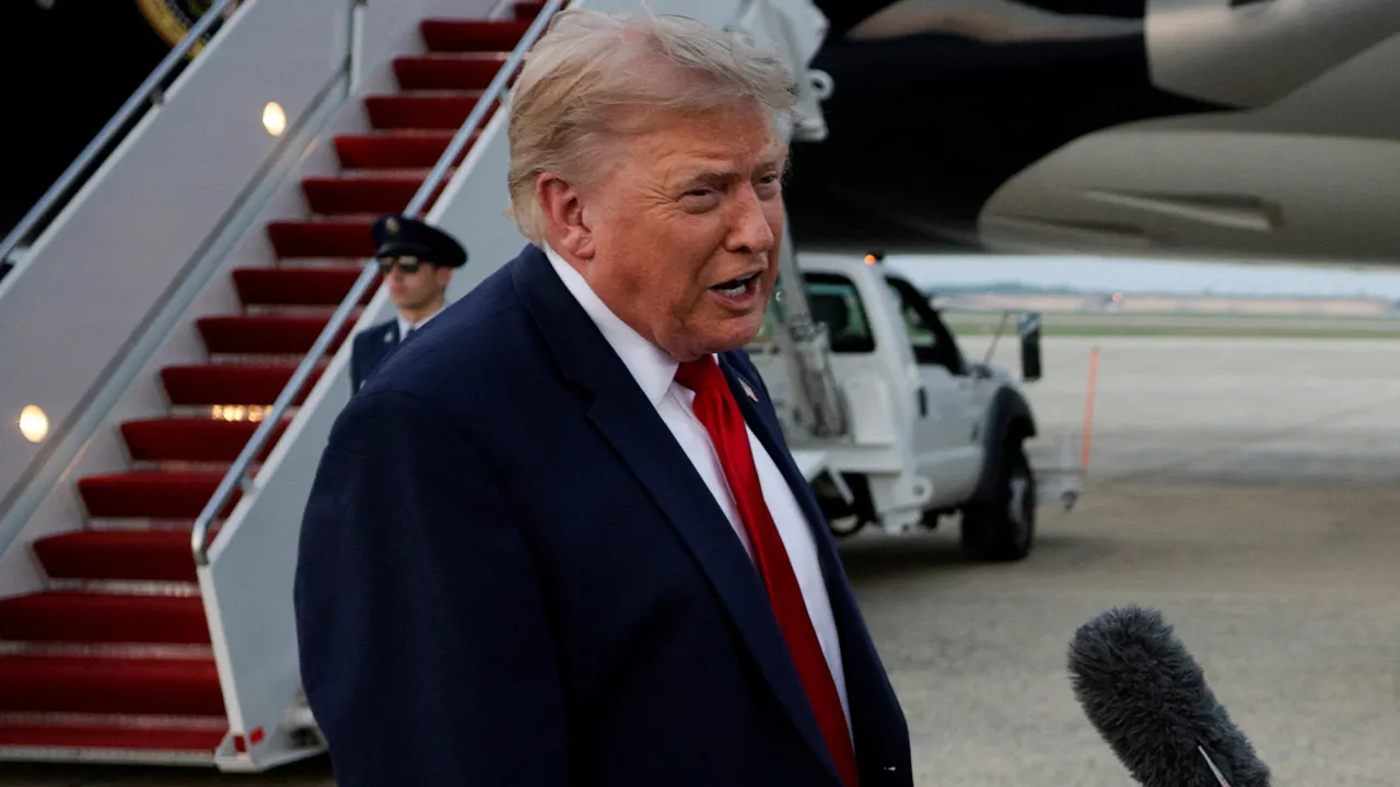 U.S. President Donald Trump speaks with the media as he arrives at Joint Base Andrews in Maryland, U.S., July 19, 2026. REUTERS/Evan Vucci
