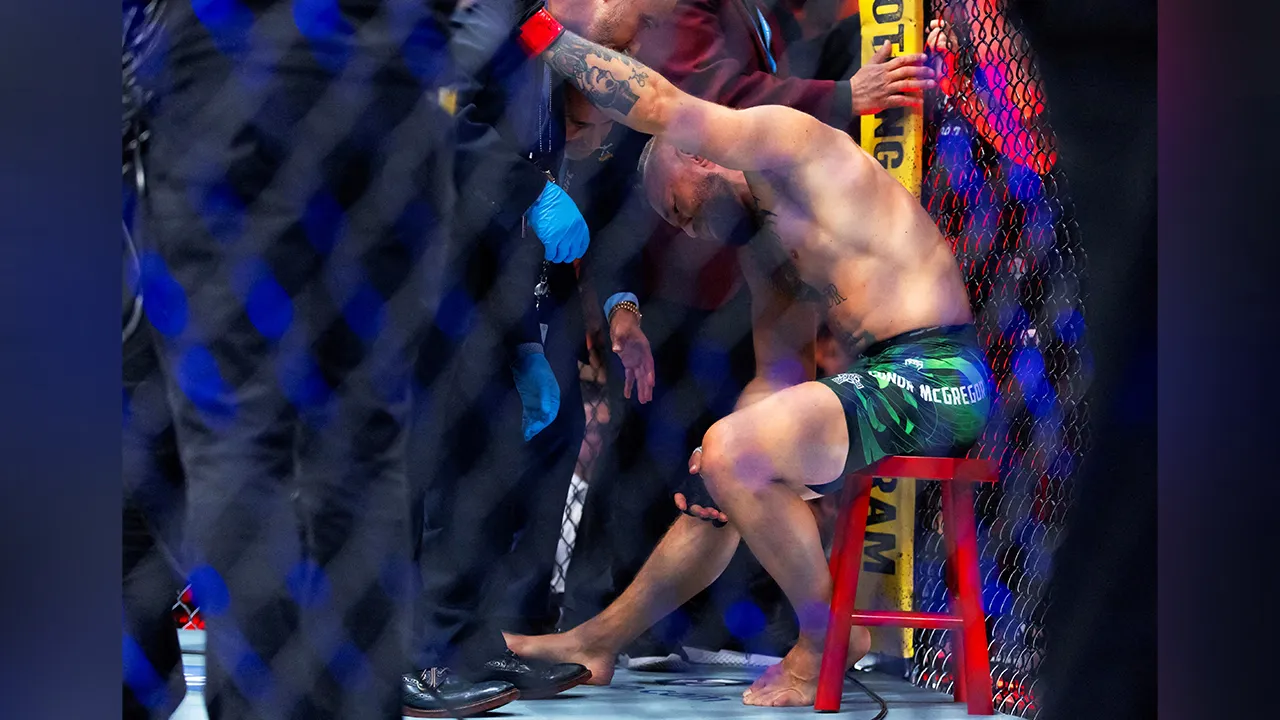 Jul 11, 2026; Las Vegas, Nevada, USA; Conor McGregor reacts after suffering an injury the ended his fight with Max Holloway during UFC 329 at T-Mobile Arena. Mandatory Credit: Mark J. Rebilas-Imagn Images/File Photo