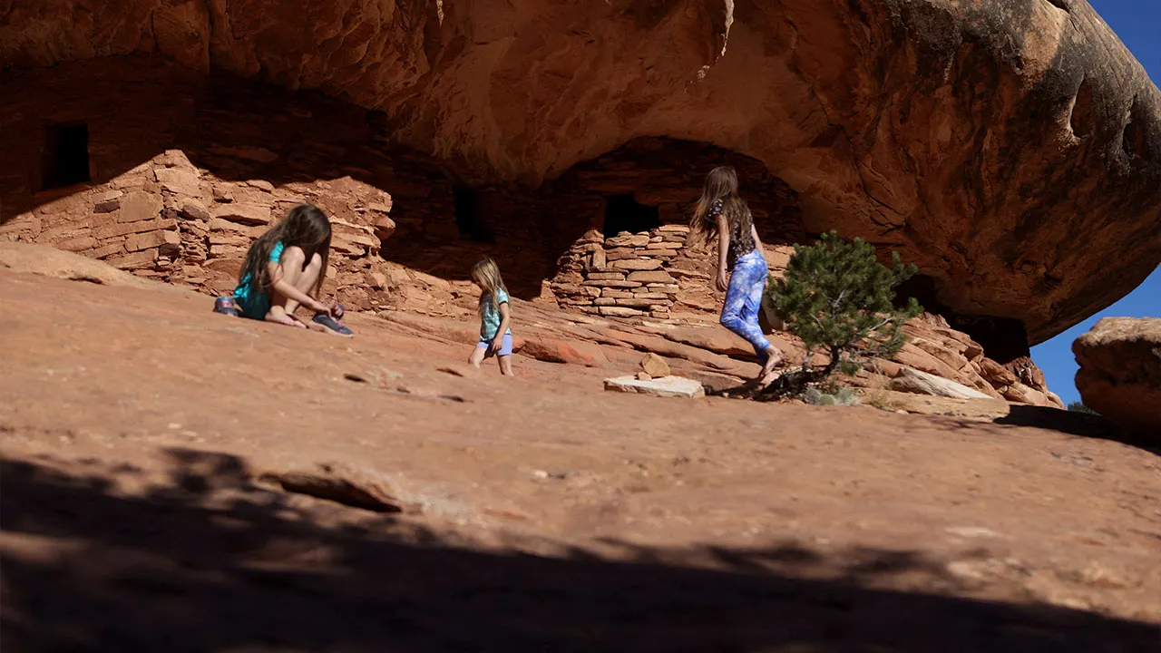 FILE PHOTO: Children explore as the sun sets on the ancestral Puebloan House on Fire ruins in the Bears Ears National Monument outside Blanding, Utah, U.S., October 22, 2023. REUTERS/Jim Urquhart/File Photo