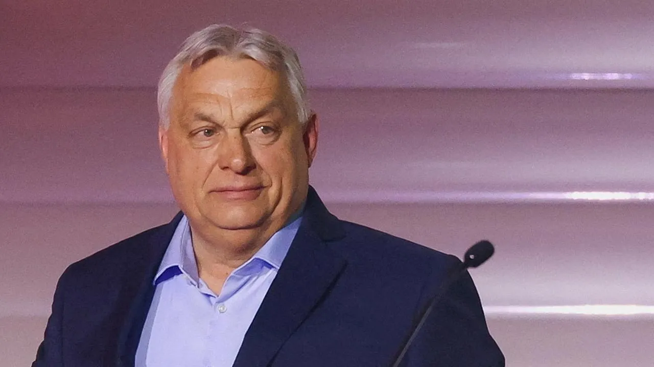 FILE PHOTO: Hungarian Prime Minister Viktor Orban arrives to address supporters after the announcement of the partial results of parliamentary election in Budapest, Hungary, April 12, 2026. REUTERS/Bernadett Szabo/File Photo