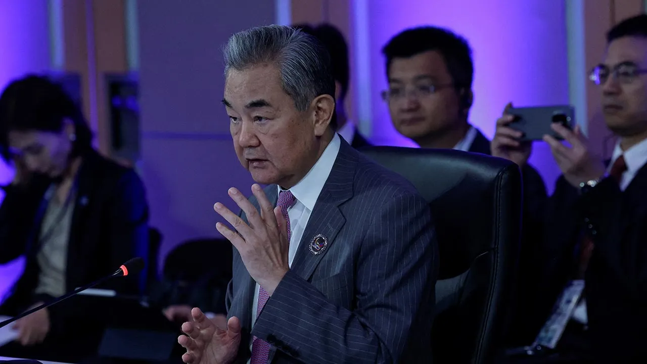 Chinese Foreign Minister Wang Yi speaks during the Opening Statement of the ASEAN Post-Ministerial Conference with China, at the Philippine International Convention Centre in Pasay City, Metro Manila, Philippines, July 22, 2026. ROLEX DELA PENA/Pool via REUTERS