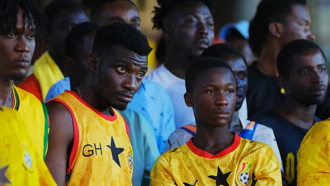 Soccer Football - FIFA World Cup 2026 - Round of 32 - Colombia v Ghana - Fans gather in Accra - Accra, Ghana - July 4, 2026 Ghana fans watch on in Osu, Accra during the match REUTERS/Francis Kokoroko