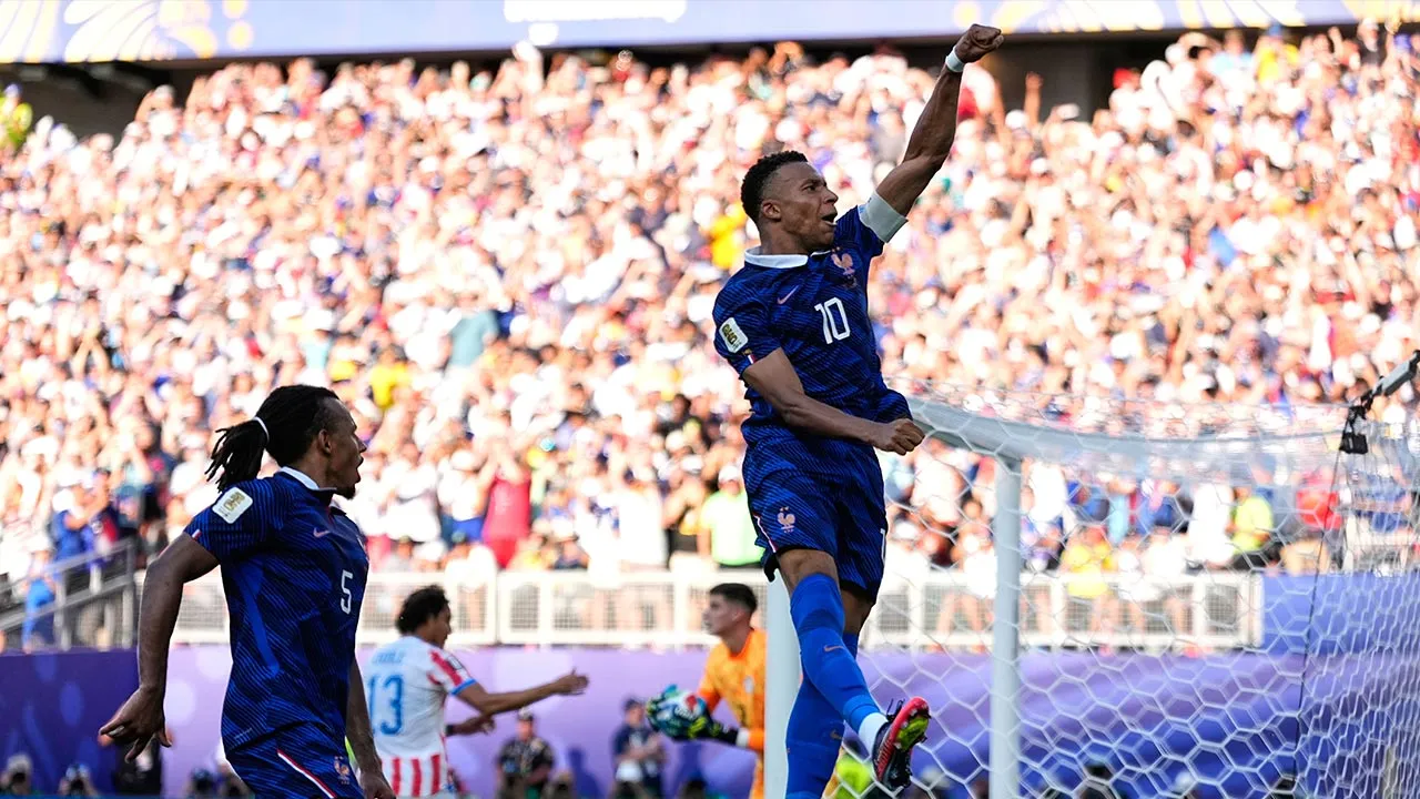 France's Kylian Mbappe celebrates after scoring from the penalty spot the opening goal during the World Cup round of 16 soccer match between Paraguay and France in Philadelphia, Saturday, July 4, 2026. (AP Photo/Matt Slocum)
