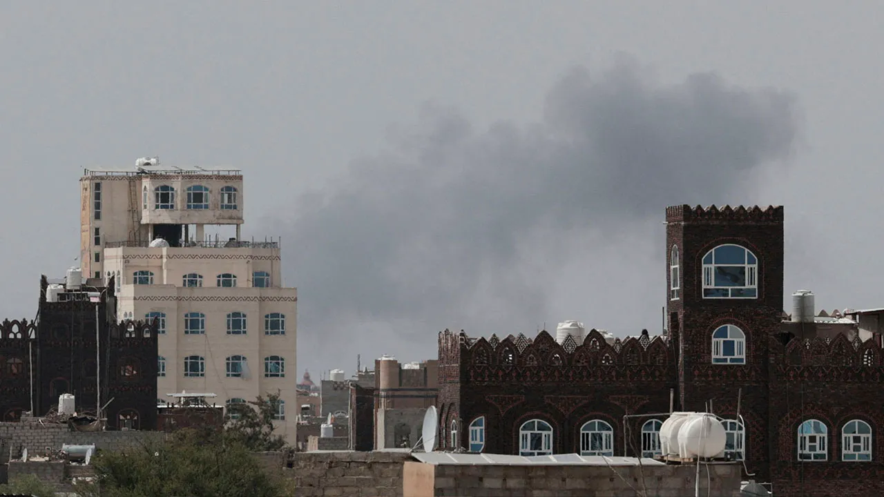 Smoke rises following an airstrike after Yemen's defense ministry said that its armed forces had targeted the runway at Sanaa International Airport, in Sanaa, Yemen, July 13, 2026. REUTERS/Khaled Abdullah 
