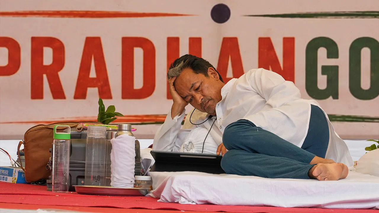 Climate activist Sonam Wangchuk lies while undertaking an indefinite hunger strike during a protest by the Cockroach Janta Party demanding the resignation of Education Minister Dharmendra Pradhan over alleged examination irregularities and repeated paper leaks in New Delhi, India, Tuesday, June 30, 2026 (AP Photo/Manish Swarup)