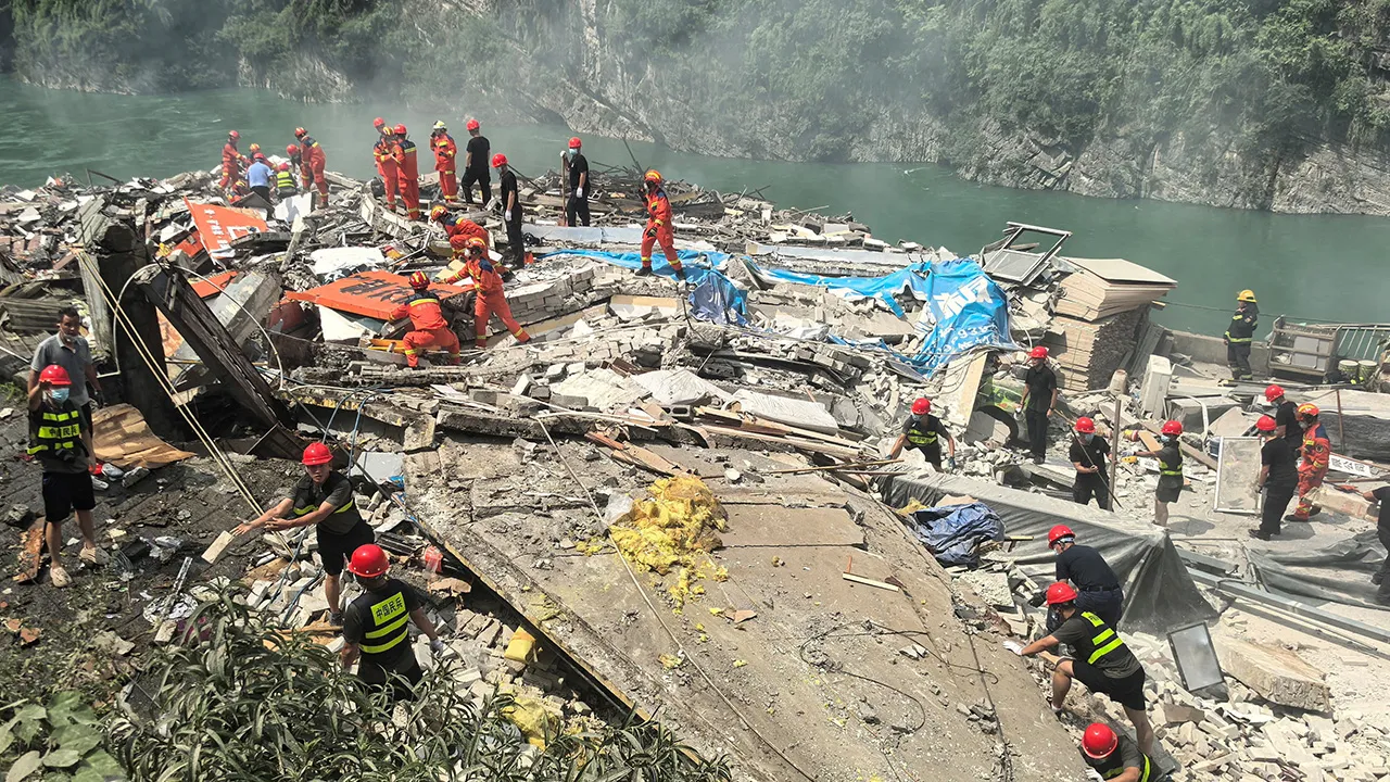 Rescue workers search for survivors at the site of a landslide along Wujiang river in Pengshui Miao and Tujia Autonomous County, Chongqing, China July 17, 2026. cnsphoto via REUTERS