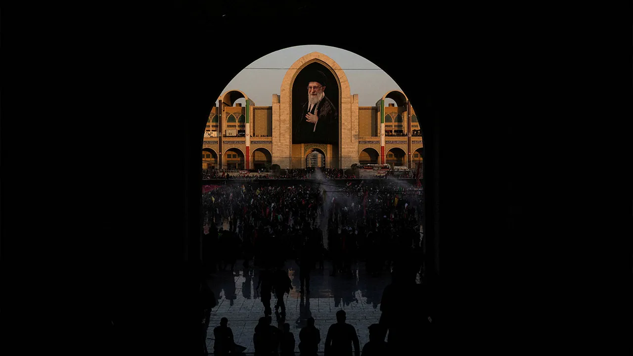 A portrait of late Supreme Leader Ayatollah Ali Khamenei, who was killed on February 28 in Israeli and U.S. airstrikes, hangs at the Imam Khomeini Grand Mosalla, as mourners attend a public farewell ceremony, in Tehran, Iran July 4, 2026. REUTERS/Alkis Konstantinidis 