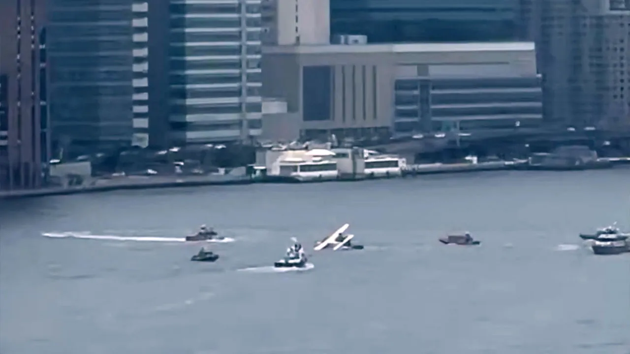 This image taken from video shows a seaplane after it made a rough landing in New York City's East River on Sunday, July 5, 2026, resulting in two minor injuries. (@brianmichaelf/X via AP)