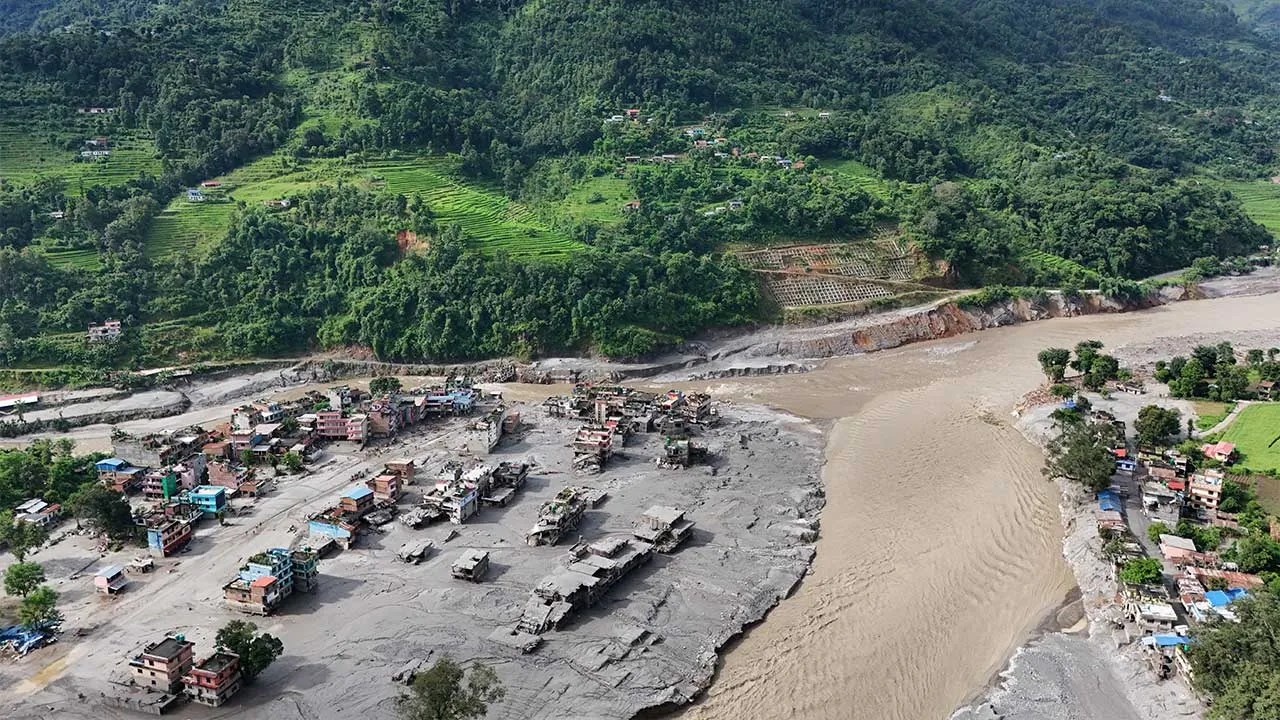 A drone view shows mud covering buildings and property following devastating floods at Trishuli in Nuwakot district, Nepal, August 27, 2026. REUTERS/Navesh Chitrakar