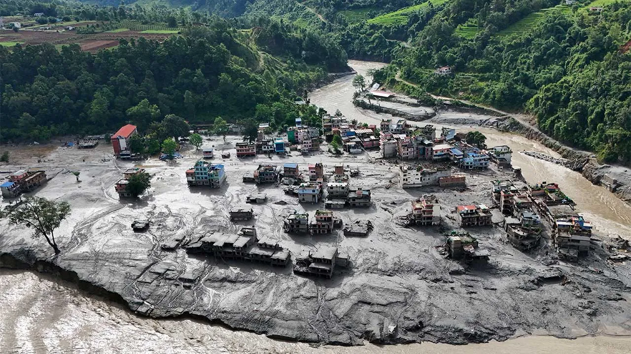 A drone view shows mud covering buildings and property following devastating floods at Trishuli in Nuwakot district, Nepal, August 27, 2026. REUTERS/Navesh Chitrakar