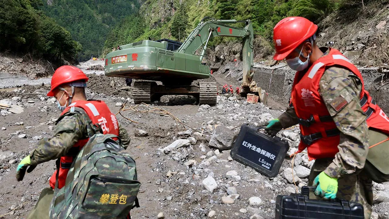 Chinese People's Armed Police officers carry out search and rescue operations near Gyirong port following a mudslide, in Shigatse, Tibet Autonomous Region, China August 30, 2026. China Daily via REUTERS ATTENTION EDITORS - THIS PICTURE WAS PROVIDED BY A THIRD PARTY. CHINA OUT. NO COMMERCIAL OR EDITORIAL SALES IN CHINA.