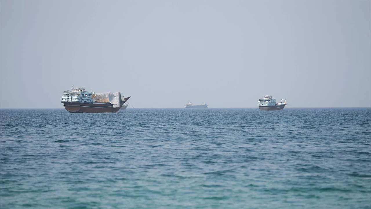 FILE PHOTO: Vessels near the Strait of Hormuz, as seen from Musandam, Oman, August 6, 2026. REUTERS/Stringer/File Photo
