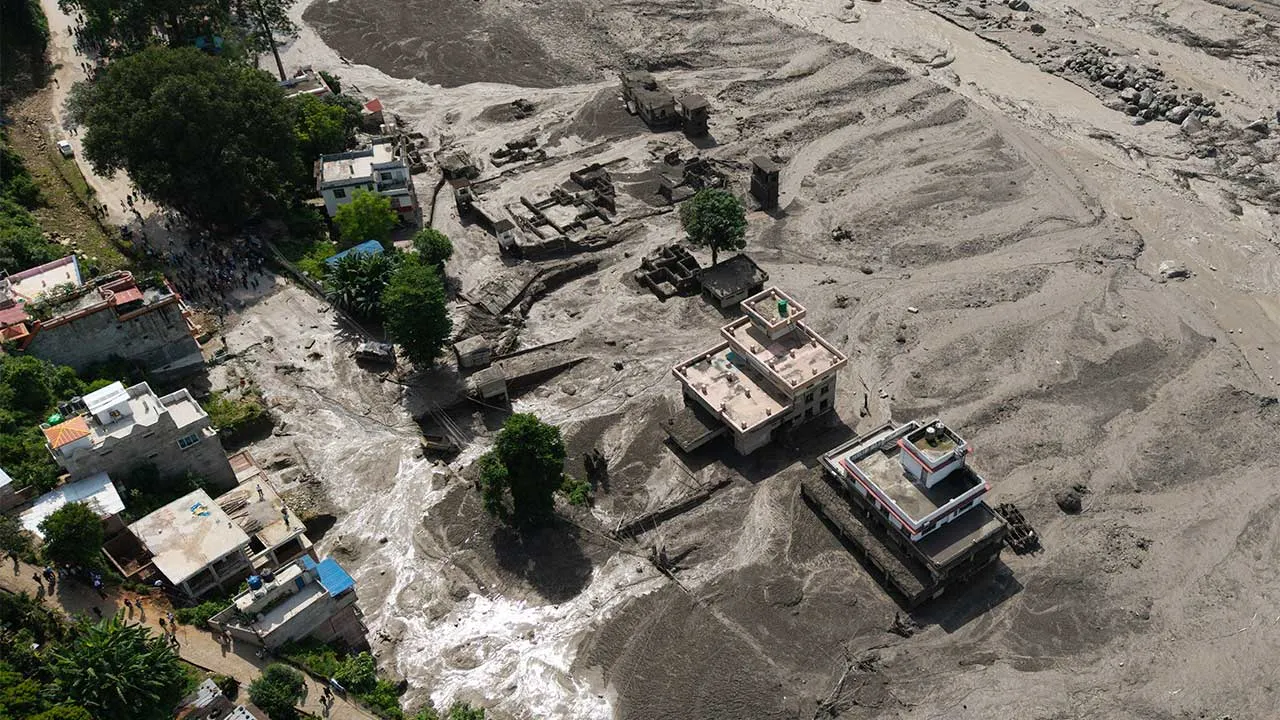 A drone view shows mud covering properties following a flash flood at Trishuli in Nuwakot district, Nepal, August 26, 2026. REUTERS/Stringer