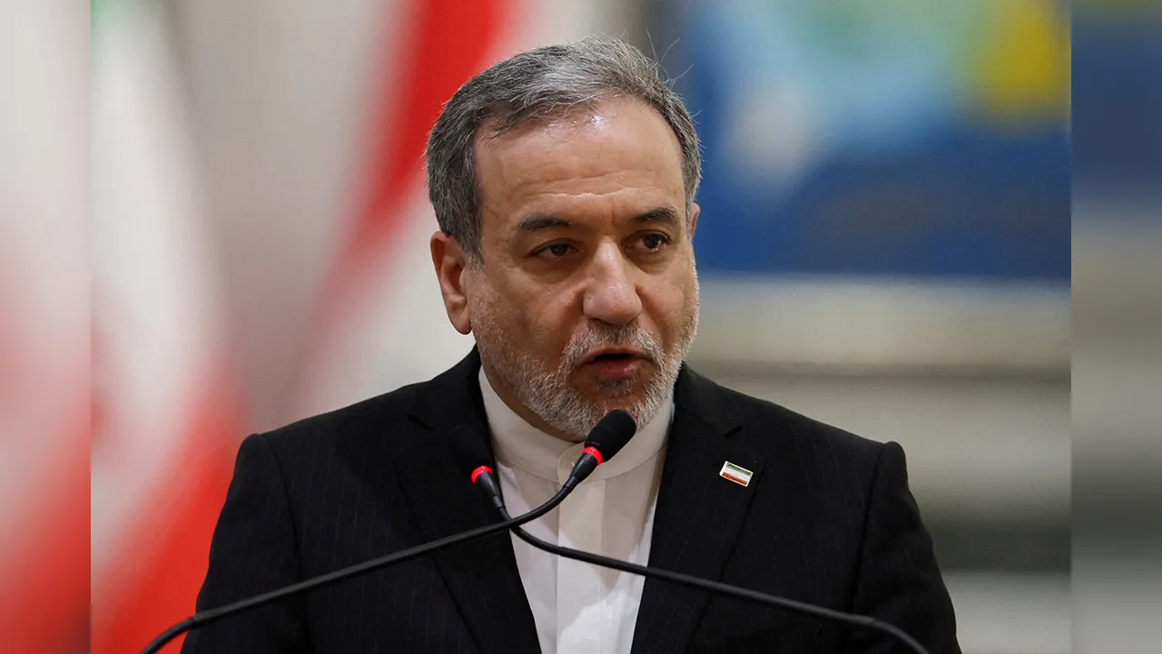 FILE PHOTO: Iranian Foreign Minister Abbas Araqchi attends a press conference alongside Iraqi Foreign Minister Fuad Hussein (not pictured), in Baghdad, Iraq, June 28, 2026. REUTERS/Thaier Al-Sudani/File Photo