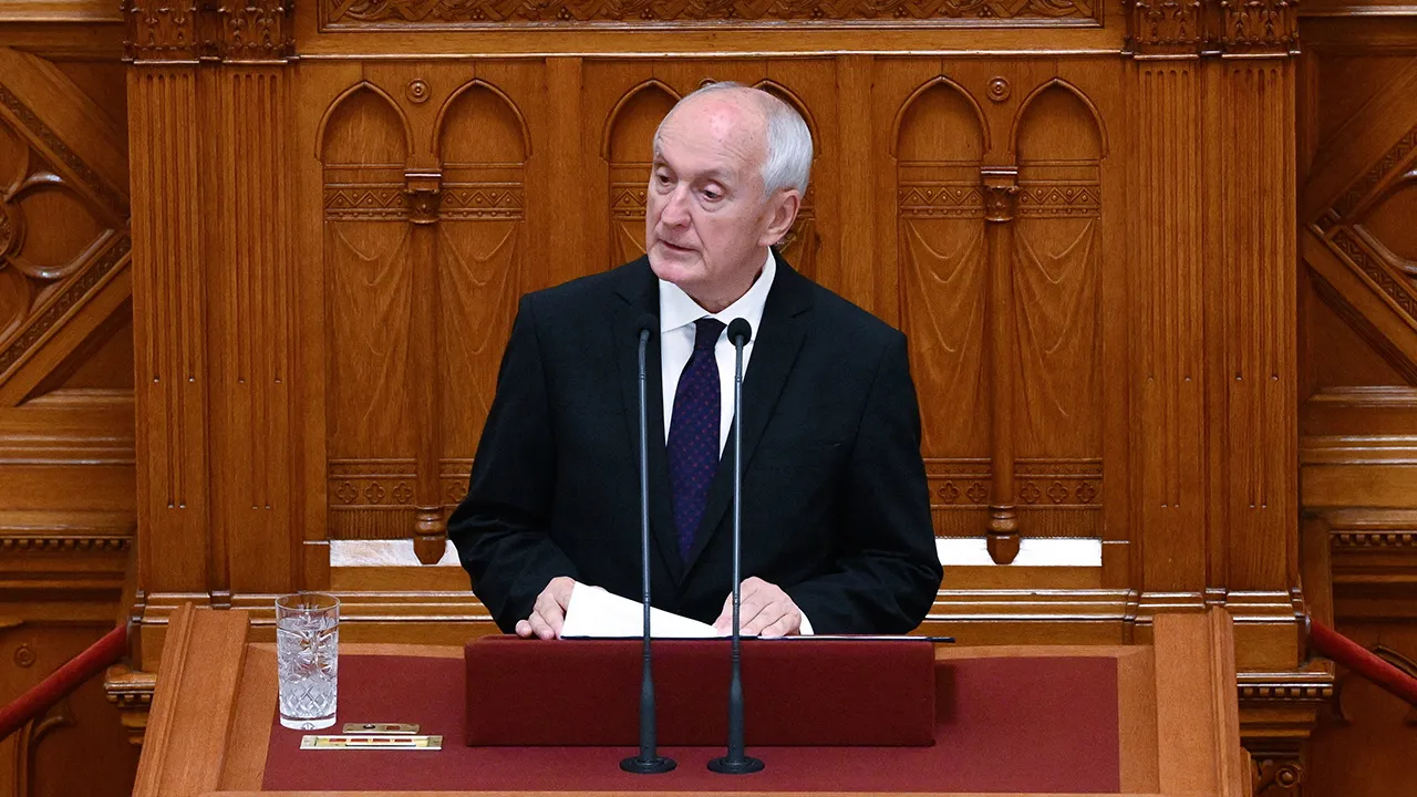 President-elect and former Supreme Court president Andras Baka delivers a speech after being elected President of the Republic during the extraordinary plenary session of the Hungarian Parliament in Budapest, Hungary, Tuesday, Aug. 11, 2026. Lawmakers elected him with 140 votes in favour and six against. (Zoltan Mathe/MTI via AP)