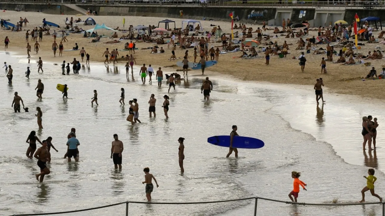 People enjoy the beach as parts of Australia's east reached their hottest day in more than two years amid temperatures which rose to 40 degrees Celsius (104 degrees Fahrenheit), in Bondi Beach, Sydney, Australia, March 6, 2023. REUTERS/Jaimi Joy/File Photo