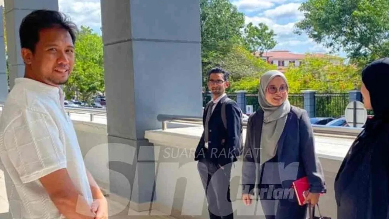 Calon PH PRN Negeri Sembilan Azizul Hakim (kini) ketika hadir ke Mahkamah Sesyen Seremban. -- SINAR HARIAN