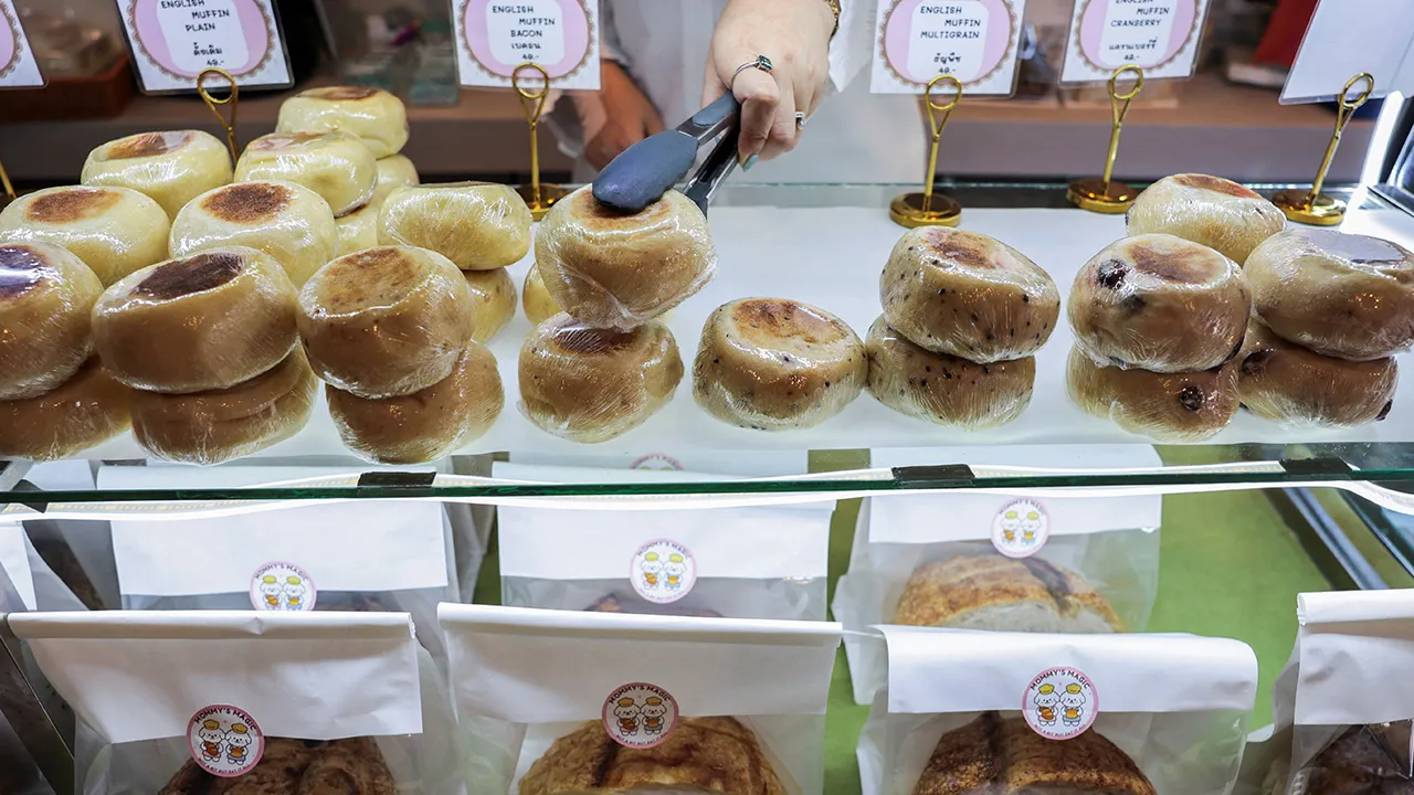A worker prepares bread for sale at Suchart and Friends Gun Shop in Bangkok’s historic gun district, where the shop has operated since 1956 and switched to selling sourdough bread before the latest deadly mass shooting because it could no longer import firearms for sale, while continuing to renew its firearm licence each year, as Thailand has suspended firearm purchase permits and announced plans for tougher gun control laws, including a ban on firearm imports and a range of other restrictions, following th