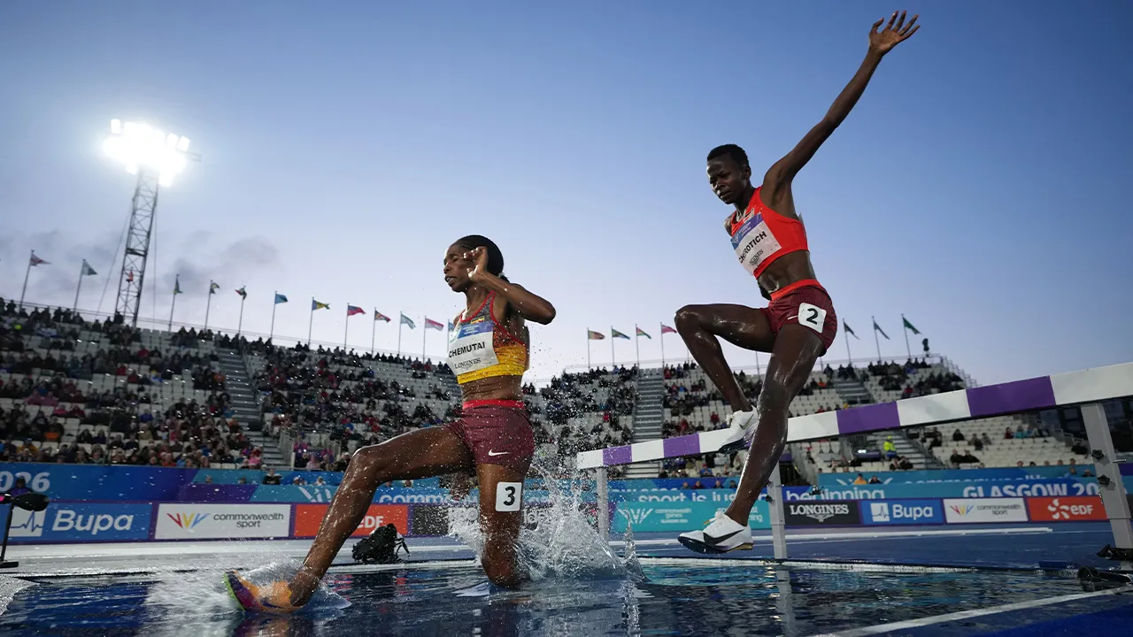 Peruth Chemutai, of Uganda, and Faith Cherotich, of Kenya, compete in the women's 3,000 meters steeplechase final at the Commonwealth Games in Glasgow, Scotland, Wednesday, July 29, 2026. (AP Photo/Alastair Grant)