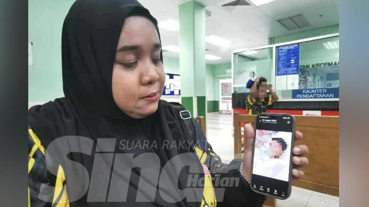 Puteri Anis Athirah menunjukkan keadaan anaknya yang kini dirawat di Jabatan Kecemasan HSNZ di Kuala Terengganu pada Isnin.