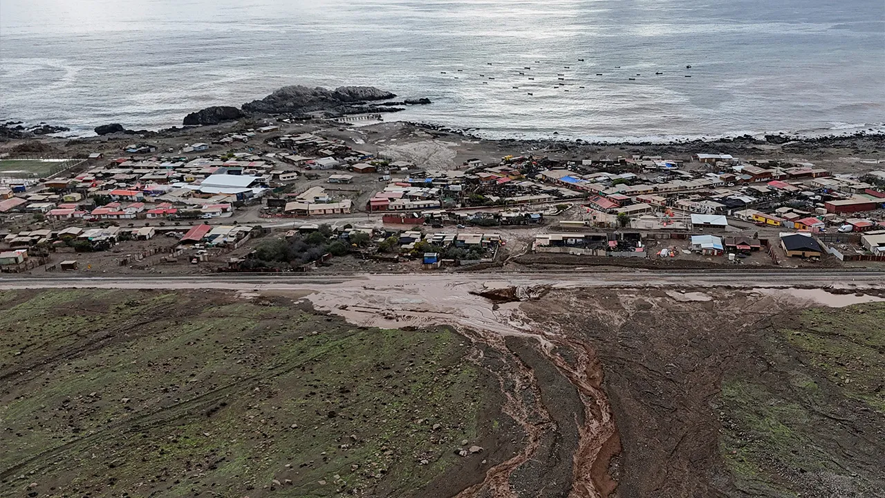 A drone view shows a rainstorm-triggered landslide covering a portion of a road in the northern Antofagasta region, in Paposo, Chile August 18, 2026. REUTERS/Rodrigo Gutierrez