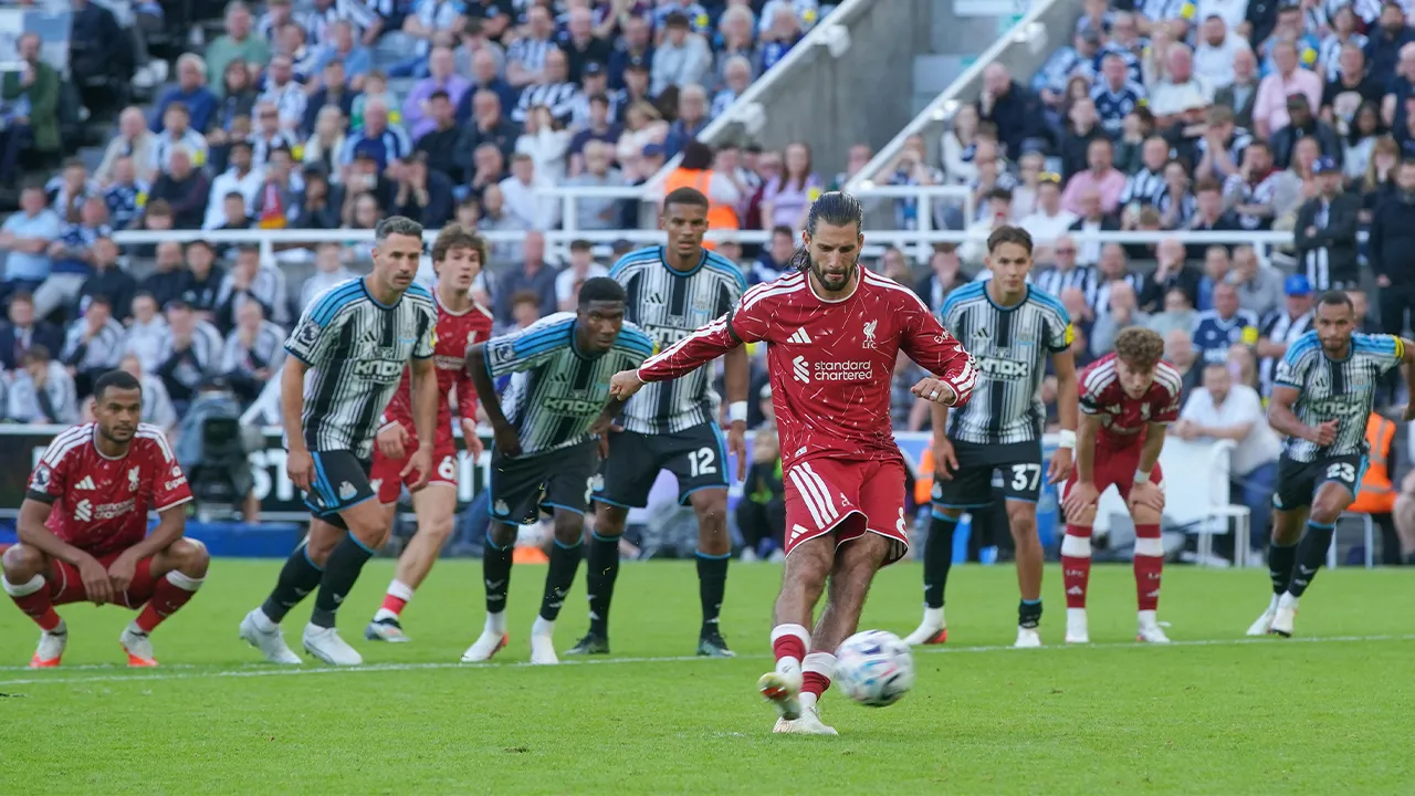 Liverpool's Dominik Szoboszlai takes a penalty kick during the English Premier League soccer match between Newcastle United and Liverpool in Newcastle, England, Sunday, Aug. 23, 2026. (AP Photo/Ian Hodgson)