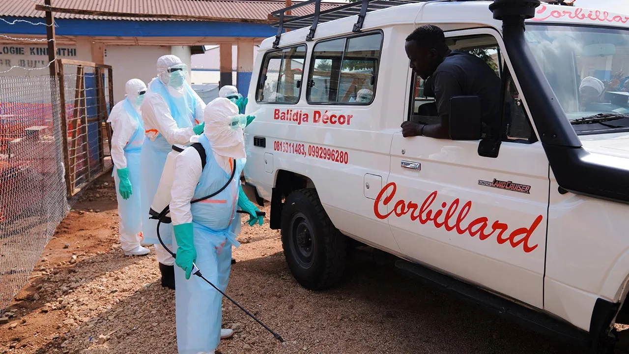 alth workers disinfects an ambulance at Ebola Treatment Center at Bunia General Hospital in Ituri, Congo, Wednesday, July 22, 2026. (AP Photo/Dirole Lotsima Dieudonne)