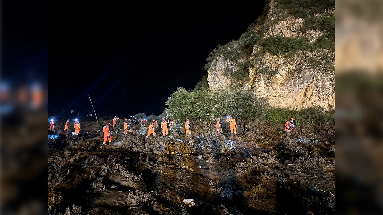 Rescue workers carry out search and rescue operations following flash floods at a scenic area in Weiyuan county, Dingxi city, Gansu province, China July 26, 2026. cnsphoto via REUTERS ATTENTION EDITORS - THIS IMAGE WAS PROVIDED BY A THIRD PARTY. CHINA OUT. NO COMMERCIAL OR EDITORIAL SALES IN CHINA