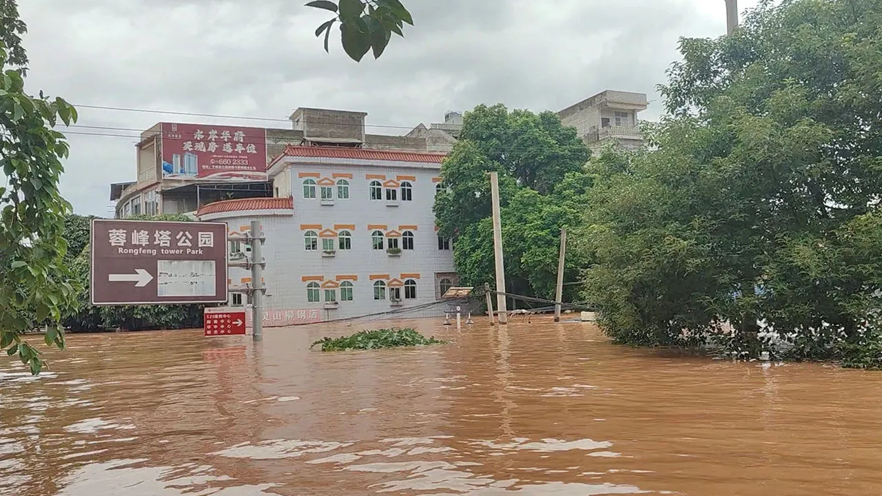 Floodwaters inundate a street after heavy rainfall brought by typhoon Narra caused flooding in Chongzuo, Guangxi Region, China, in this screengrab obtained from a social media video released on August 24, 2026. Social Media/via REUTERS