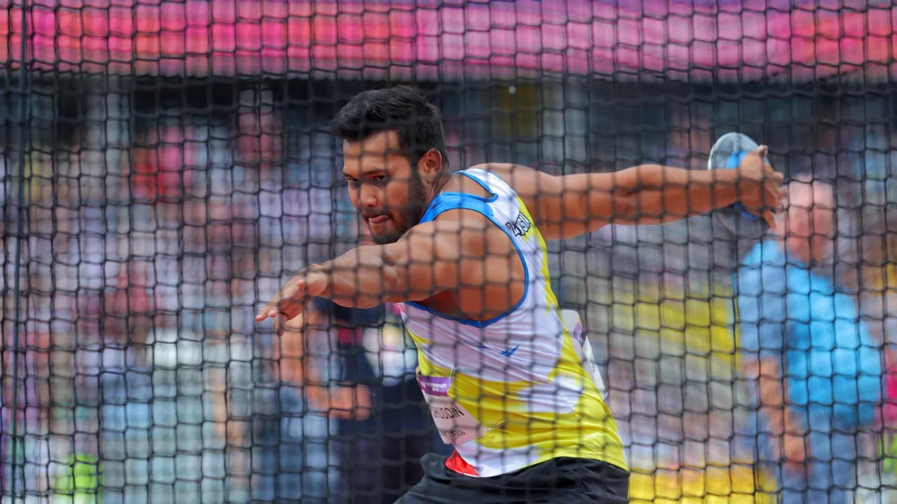 BIRMINGHAM, 2 Ogos -- Atlet lempar cakera negara Muhammad Irfan Shamsuddin melakukan lontaran ketika beraksi pada pusingan kelayakan lempar cakera lelaki semasa Sukan Komanwel Birmingham 2022 di Stadium Alexander pada Selasa. Muhammad Irfan berjaya malakukan lontaran sejauh 57.93.  --fotoBERNAMA (2022) HAK CIPTA TERPELIHARA