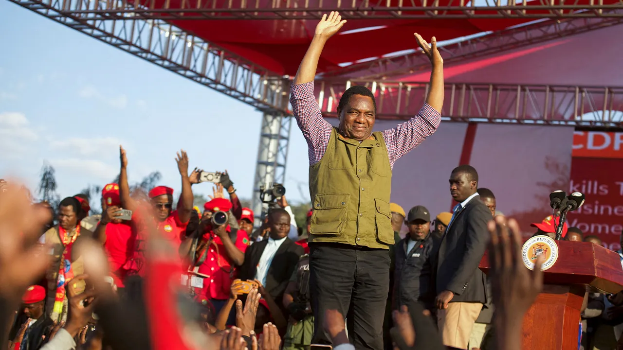 FILE PHOTO: Zambia's President Hakainde Hichilema greets United Party for National Development (UPND) supporters during their election campaign launch in Lusaka, Zambia, June 28, 2026. REUTERS/Moses Mwape/File Photo