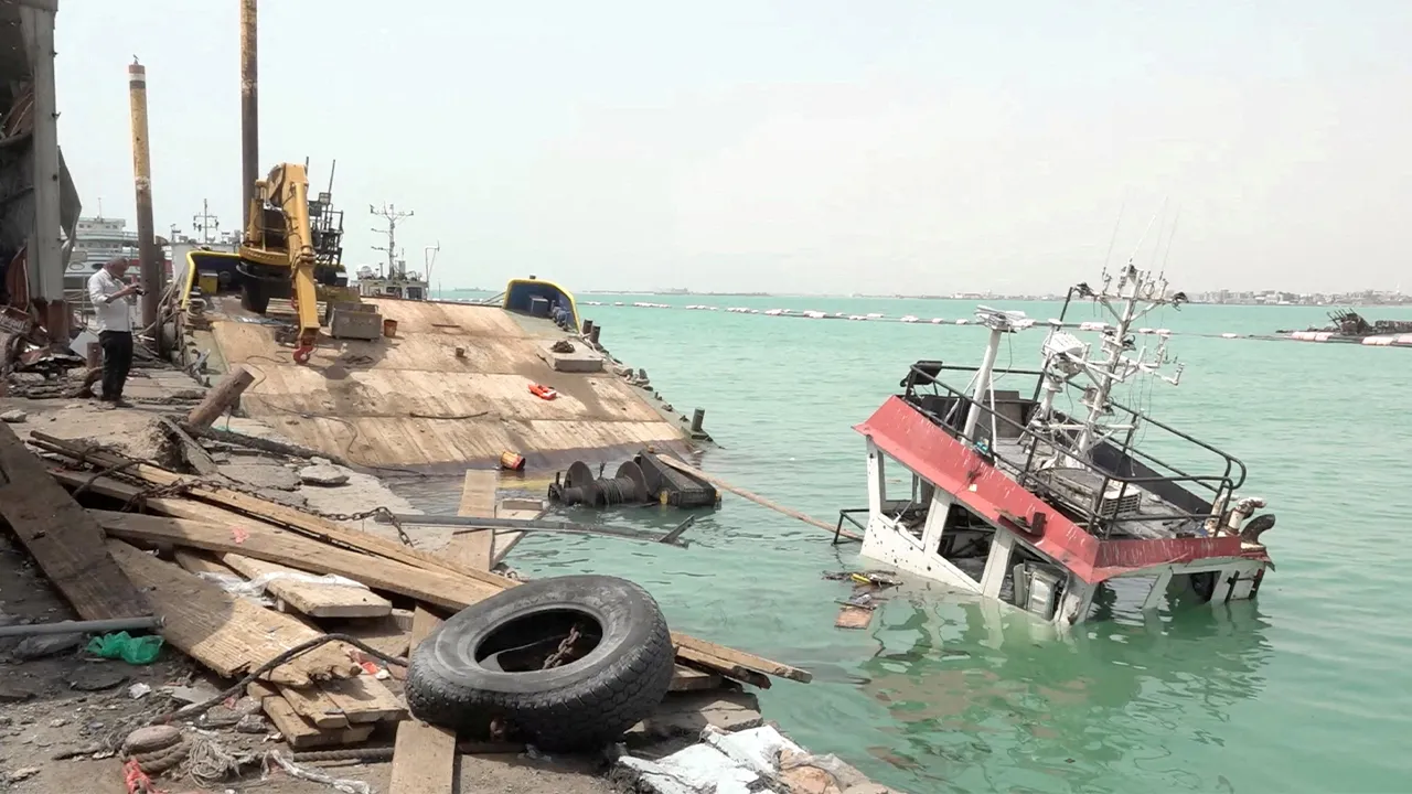 FILE PHOTO: Damage in the aftermath of Houthi strikes on the Red Sea port city of Mocha, Yemen, August 10, 2026 in this screengrab taken from a handout video.Al Joumhouriya TV/Handout via REUTERS THIS IMAGE HAS BEEN SUPPLIED BY A THIRD PARTY. VERIFICATION: -Buildings, port layout, shape of coastline and mosque minarets matched satellite imagery -Coordinates: 13.311049190926814, 43.23139230789606 -Date verified by a statement a statement from the Yemeni military saying that on August 10 the Houthis attacked 