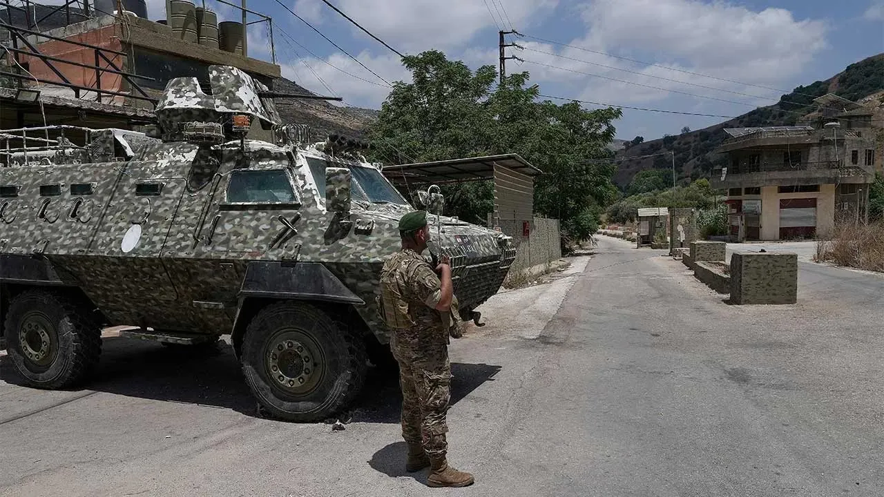 A Lebanese army soldier stands at a checkpoint in Froun village, southern Lebanon, Thursday, July 16, 2026. (AP Photo/Mohammed Zaatari)