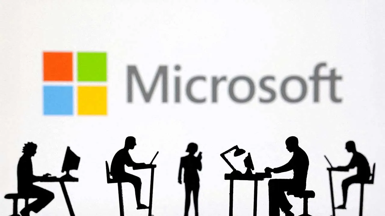 FILE PHOTO: FILE PHOTO: Figurines with computers and smartphones are seen in front of Microsoft Corporation logo in this illustration taken, February 19, 2024. REUTERS/Dado Ruvic/Illustration/File Photo/File Photo