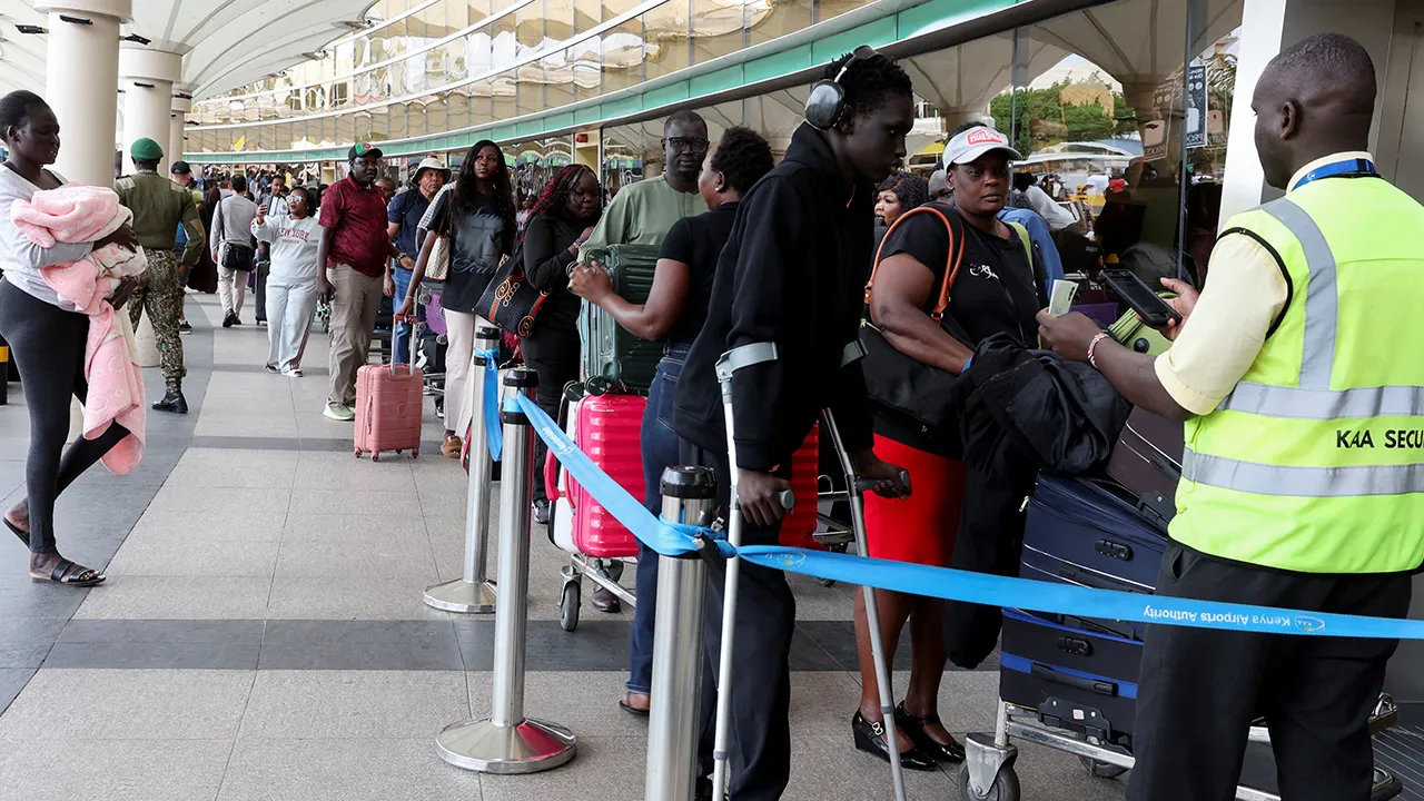 Travellers queue at the airport as flight operations get disrupted due to a strike by workers at the Jomo Kenyatta International Airport (JKIA) in Nairobi, Kenya, August 30, 2026. REUTERS/Monicah Mwangi
