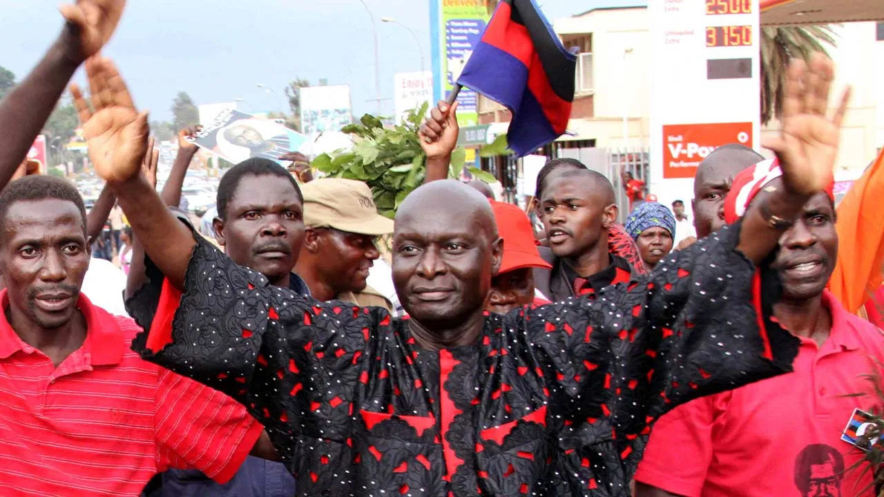 FILE PHOTO: Olara Otunnu, leader of the Uganda People's Congress party, arrives for his nomination as presidential candidate in the capital Kampala October 26, 2010. Uganda cleared on Monday candidates for next February's presidential poll seen as a test of democracy in a country about to start producing oil. REUTERS/Hudson Apunyo/File Photo