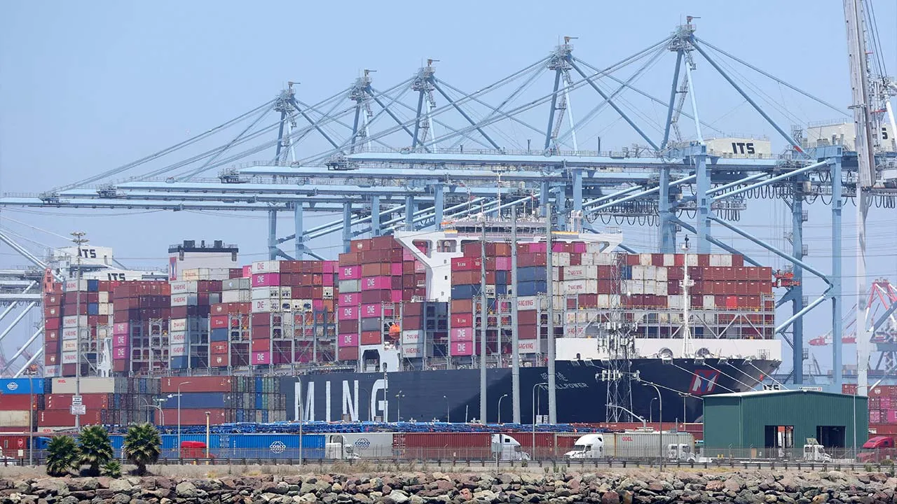 FILE PHOTO: Shipping containers on a container ship at the Port of Long Beach, California, U.S. July 17, 2026. REUTERS/Mario Anzuoni/File Photo