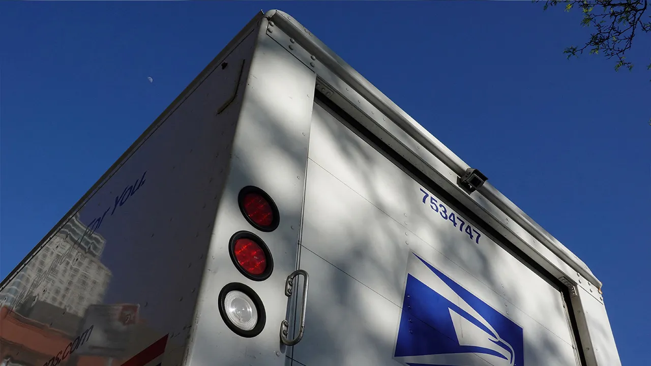  A United States Postal Service (USPS) mail delivery truck is seen in Queens, New York City, U.S., May 9, 2022. REUTERS