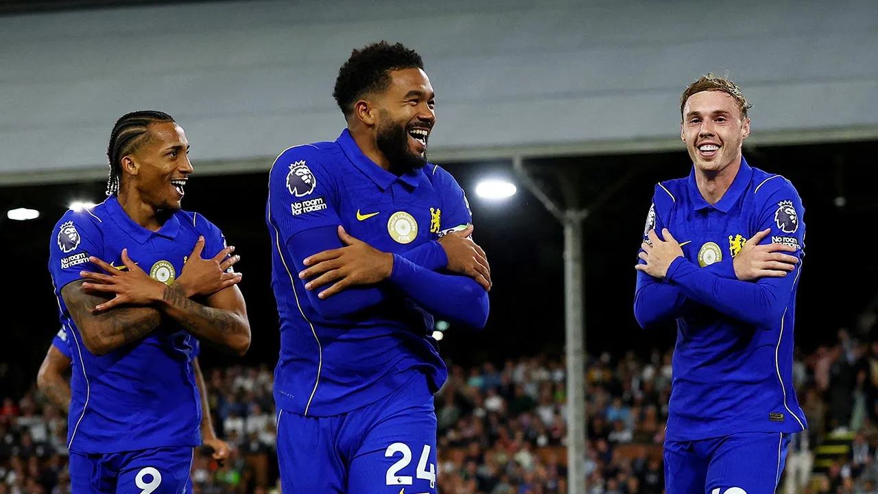 Soccer Football - Premier League - Fulham v Chelsea - Craven Cottage, London, Britain - August 24, 2026 Chelsea's Cole Palmer celebrates scoring their third goal with Joao Pedro and Reece James Action Images via Reuters/Matthew Childs