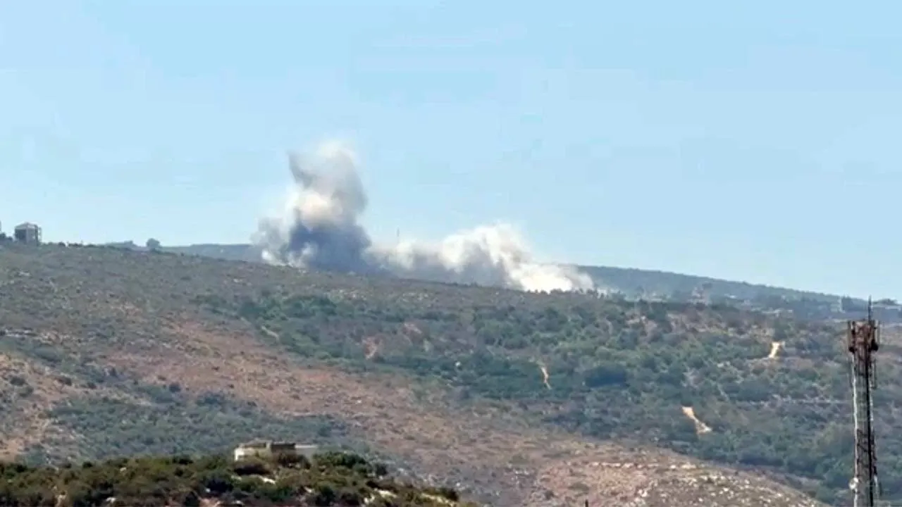 Smoke rises from a hill following Israeli air strikes, after the Israeli military issued an evacuation warning to the village of Mansouri, Lebanon, August 5, 2026 in this screengrab obtained from social media. Social Media/via REUTERS THIS IMAGE HAS BEEN SUPPLIED BY A THIRD PARTY. MANDATORY CREDIT. NO RESALES. NO ARCHIVES. Verification lines: Reuters verified the location by the building position, terrain and trees which matched archive and satellite imagery of the area. The shape of the mountains matched t
