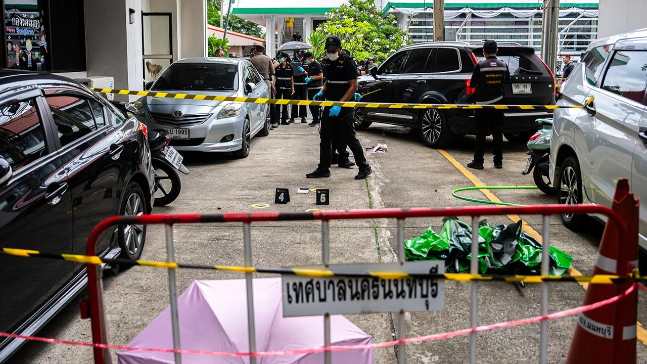 Forensic police officers inspect the site of a shooting after former lawmaker Chalong Riewrang allegedly shot Thongchai Yenprasert, president of the Nonthaburi Provincial Administrative Organisation, in Nonthaburi province, on the outskirts of Bangkok, Thailand, August 10, 2026. REUTERS/Arnun Chonmahatrakool