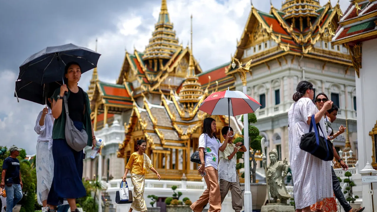 Tourists are seen inside the Grand Palace, one of the favourite tourist spots in Bangkok, Thailand, May 20, 2025. REUTERS/Athit Perawongmetha