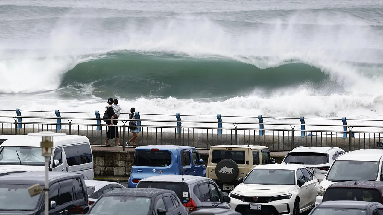 High waves caused by Tropical Storm Chan-hom crash near the shore in Oarai, Ibaraki prefecture, Japan Tuesday, Aug. 11, 2026. (/Kyodo News via AP)