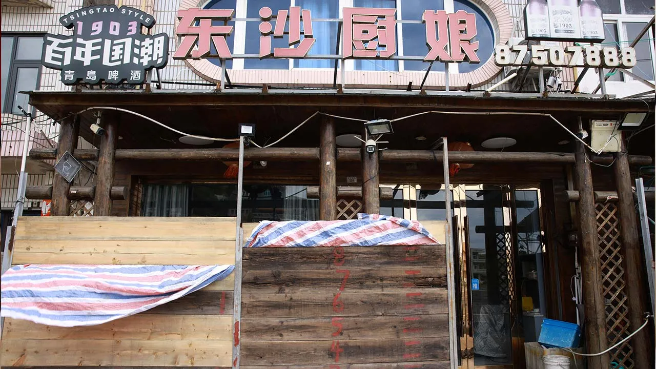 Flood barriers stand outside a shop, along the coast in Yuhuan, where Typhoon Bavi and Typhoon Dolphin made landfall, as Typhoon Saudel approaches Zhejiang province, China August 27, 2026. cnsphoto via REUTERS ATTENTION EDITORS - THIS IMAGE WAS PROVIDED BY A THIRD PARTY. CHINA OUT. NO COMMERCIAL OR EDITORIAL SALES IN CHINA.