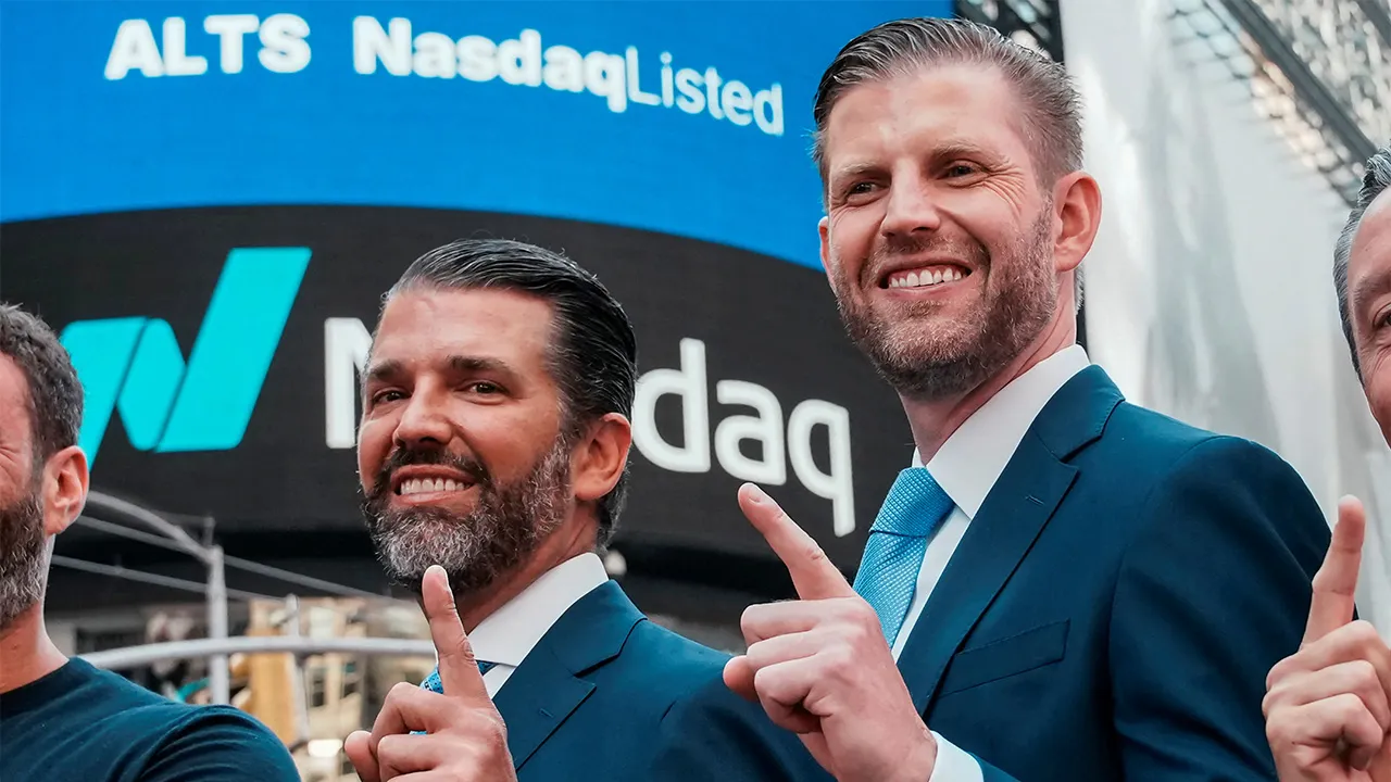 Donald Trump Jr. and Eric Trump gesture outside the Nasdaq building after ringing the opening bell to celebrate the closing of ALT5’s $1.5 billion offering and adoption of its $WLFI Treasury Strategy at the Nasdaq Market, in New York City, U.S., August 13, 2025. The president’s sons are co-founders of World Liberty crypto group and have promoted WorldClaw on social media platform X. REUTERS